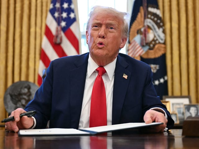 President Donald Trump signing an executive order to create a sovereign wealth fund.