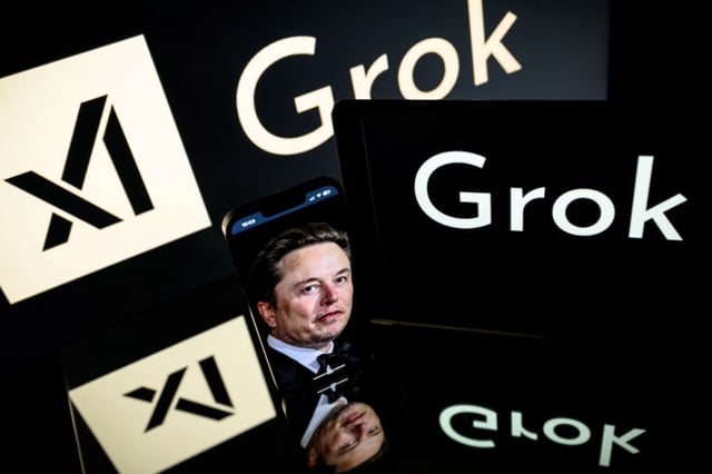 (FILES) This photo illustration taken on January 13, 2025 in Toulouse shows screens displaying the logos of xAI and Grok, a generative artificial intelligence chatbot developed by xAI, the American company specializing in artificial intelligence and it's founder South African businessman Elon Musk. Musk on March 28, 2025 said his artificial intelligence startup xAI is buying his social networking platform X in a deal valuing the company once known as Twitter at $33 billion.