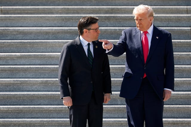 President Donald Trump and House Speaker Mike Johnson leave the Capitol on March 12, 2025.