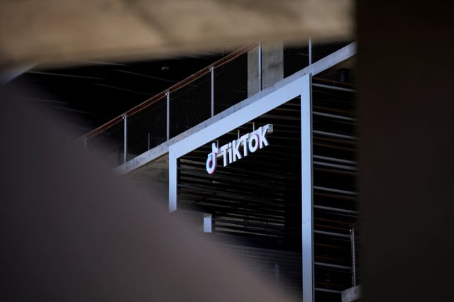 The logo of TikTok is displayed on the company office, in Culver City, California, U.S., April 2, 2025. REUTERS/Daniel Cole/File Photo