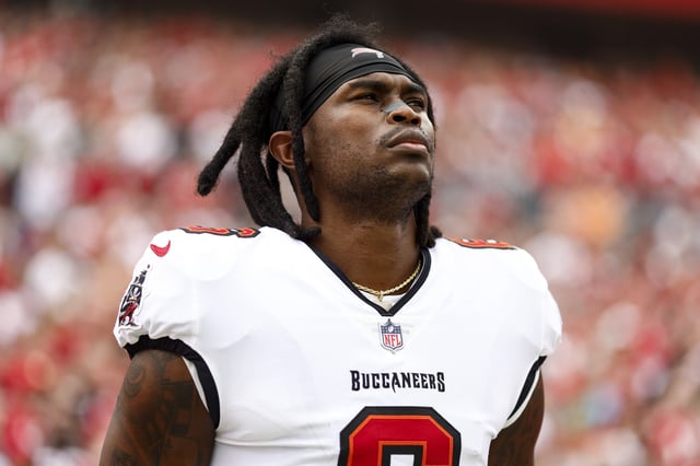 TAMPA, FL - JANUARY 1: Julio Jones #6 of the Tampa Bay Buccaneers stands on the sidelines during the national anthem prior to an NFL football game against the Carolina Panthers at Raymond James Stadium on January 1, 2023 in Tampa, Florida.