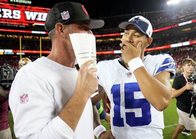 Head coach Kyle Shanahan of the San Francisco 49ers and Trey Lance of the Dallas Cowboys talk after their game at Levi&#39;s Stadium on Oct. 8, 2023, in Santa Clara, Calif.