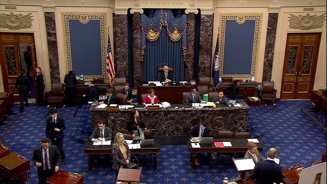 Members on the Senate floor on Friday, April 4.
