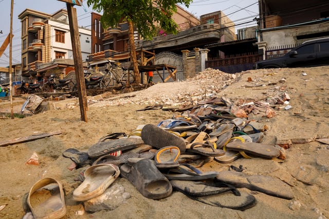 Piles of flip-flops are seen following a strong earthquake in Amarapura township, Myanmar, April 4, 2025. REUTERS/Stringer