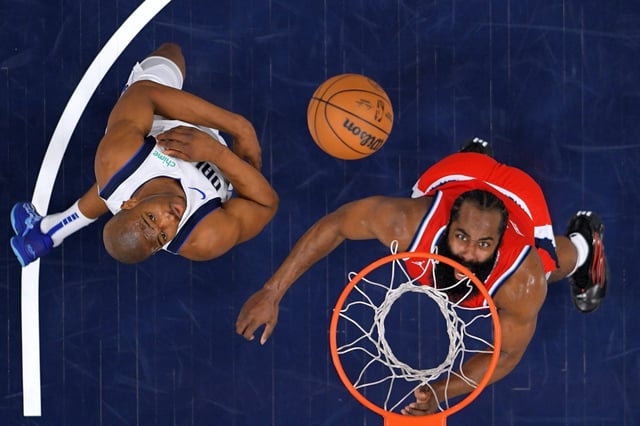 Clippers guard James Harden, right, shoots as Dallas Mavericks forward Kai Jones, left, defends during the first half on Friday night at the Intuit Dome in Inglewood. (AP Photo/Mark J. Terrill)