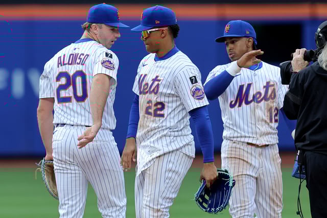 Apr 4, 2025; New York City, New York, USA; New York Mets right fielder Juan Soto (22) celebrates with first baseman Pete Alonso (20) and shortstop Francisco Lindor (12) after defeating the Toronto Blue Jays at Citi Field. Mandatory Credit: Brad Penner-Imagn Images