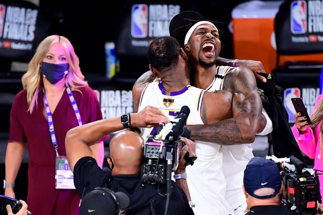 LeBron James #23 of the Los Angeles Lakers celebrates with Dwight Howard #39 of the Los Angeles Lakers after winning the 2020 NBA Championship in Game Six of the 2020 NBA Finals. Howard was inducted into the Basketball Hall of Fame.