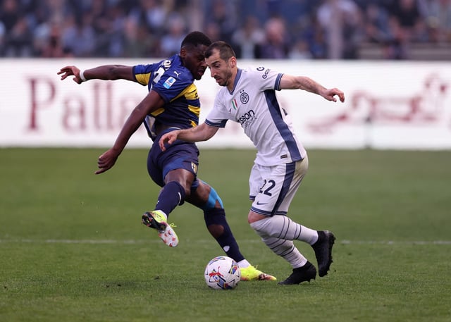 Soccer Football - Serie A - Parma v Inter Milan - Stadio Ennio Tardini, Parma, Italy - April 5, 2025 Inter Milan's Henrikh Mkhitaryan in action with Parma's Ange-Yoan Bonny REUTERS/Claudia Greco