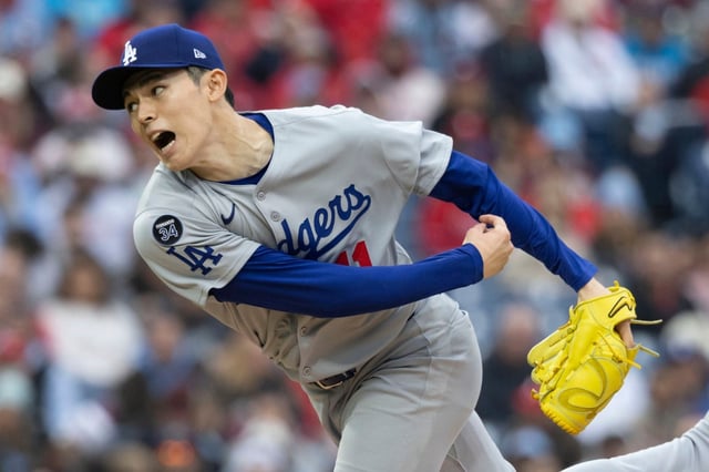 Dodgers starting pitcher Roki Sasaki throws during the first inning against the Phillies on Saturday, April 5, 2025, in Philadelphia. (AP Photo/Laurence Kesterson)
