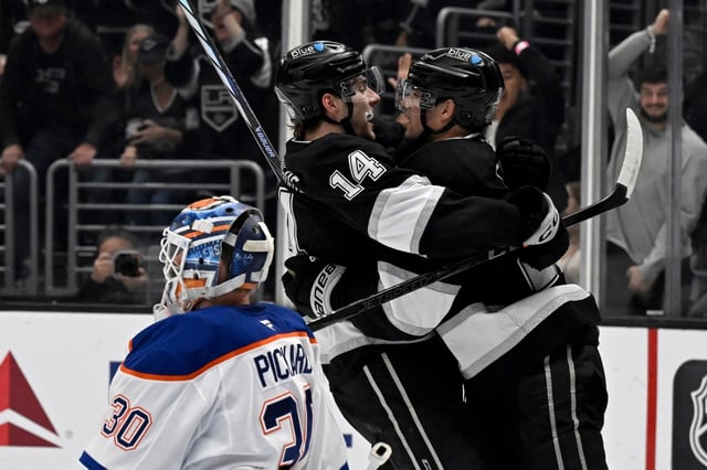 The Kings’ Kevin Fiala, right, celebrates his goal with Alex Laferriere next to Edmonton goaltender Calvin Pickard during the second period Saturday, April 5, 2025, at Crypto.com Arena. (AP Photo/Alex Gallardo)