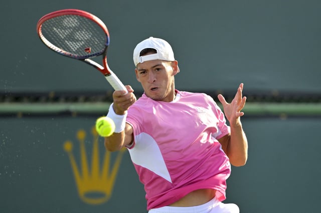 Mar 6, 2025; Indian Wells, CA, USA;  Sebastian Baez (ARG) hits a shot during first round match against Matteo Gigante (not pictured) in the BNP Paribas Open at the Indian Well Tennis Garden. Jayne Kamin-Oncea-Imagn Images/File Photo