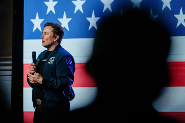 Elon Musk speaks during an America PAC town hall in Green Bay, Wis., on March 30, 2025.