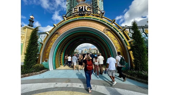 Visitors walk through the park entrance during a media preview for Universal Epic Universe on Saturday, April 5 in Orlando, Florida. (Photo by Brady MacDonald, Orange County Register/SCNG)