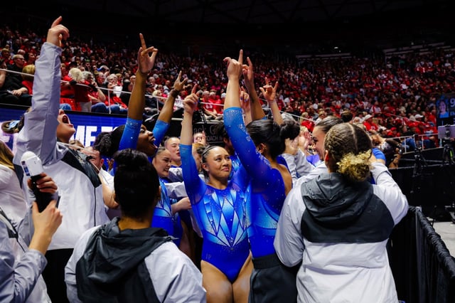 UCLA gymnasts celebrate after a strong floor rotation during an NCAA regional meet on Saturday, April 5, 2025. (Jan Kim Lim/UCLA Athletics)