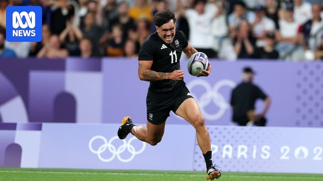 Moses Leo runs in a try for New Zealand in rugby sevens at the Paris Olympic Games.