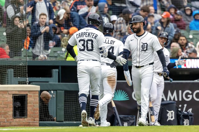 Apr 5, 2025; Detroit, Michigan, USA; Detroit Tigers outfielder Kerry Carpenter (30) celebrates hitting a two run home run with outfielder Riley Greene (31) in the second inning against the Chicago White Sox at Comerica Park. Mandatory Credit: David Reginek-Imagn Images