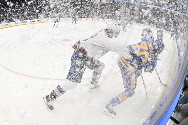 Apr 5, 2025; St. Louis, Missouri, USA;  St. Louis Blues center Oskar Sundqvist (70) skates against Colorado Avalanche left wing Miles Wood (28) during the second period at Enterprise Center. Mandatory Credit: Jeff Curry-Imagn Images