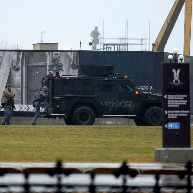 Tactical police officers attend an incident at East Block on Parliament Hill in Ottawa, on Saturday, April 5, 2025. THE CANADIAN PRESS/Justin Tang