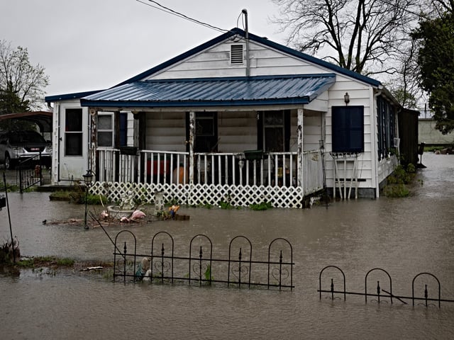 WILSON CITY, MISSOURI - APRIL 05: Water surrounds a home on April 05, 2025 in Wilson City, Missouri. Between 6 and 9 inches of rain have fallen around southeastern Missouri, southern Illinois and western Kentucky, causing flooding of rivers, creeks, streams, and other low-lying and flood-prone locations. (Photo by Scott Olson/Getty Images)
