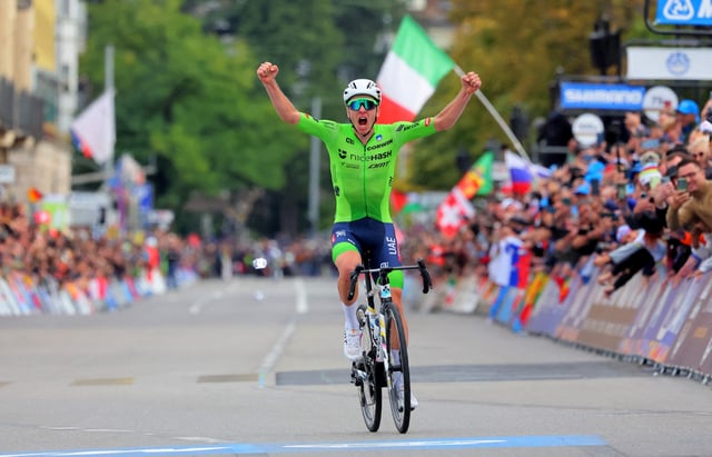Cycling - UCI World Championships 2024 - Men's Elite Road Race - Zurich, Switzerland - September 29, 2024 Slovenia's Tadej Pogacar celebrates winning the race REUTERS/Denis Balibouse/File Photo