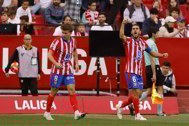 Soccer Football - LaLiga - Sevilla v Atletico Madrid - Ramon Sanchez Pizjuan, Seville, Spain - April 6, 2025 Atletico Madrid's Pablo Barrios celebrates scoring their second goal with Atletico Madrid's Koke REUTERS/Marcelo Del Pozo