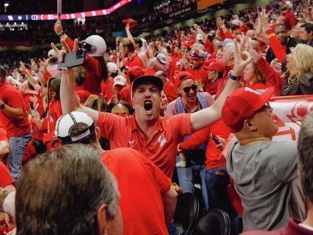 Houston fans celebrate during Saturday night&#39;s NCAA Tournament semifinal game against Duke at the Alamodome.