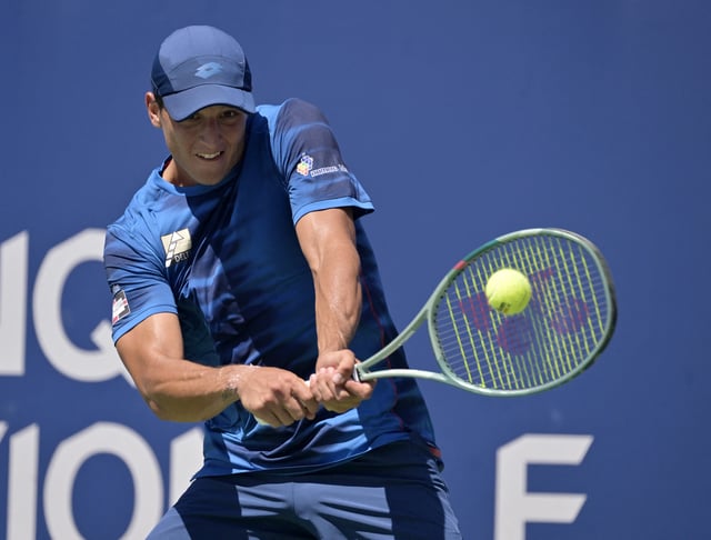 Aug 7, 2024; Montreal, Quebec, Canada; Luciano Darderi (ITA) hits a backhand against Tommy Paul (USA) (not pictured) in first round play at IGA Stadium. Eric Bolte-USA TODAY Sports/File Photo