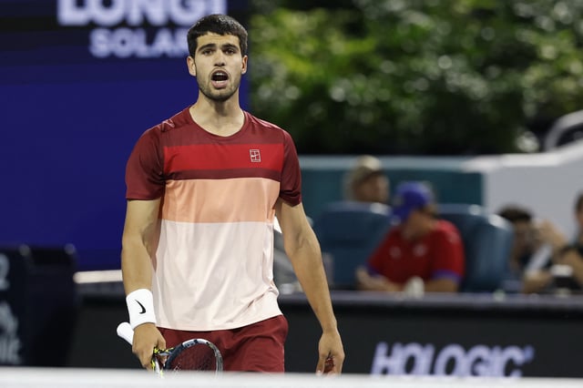 Mar 21, 2025; Miami, FL, USA; Carlos Alcaraz (ESP) talks to his box between points against David Goffin (BEL)(not pictured) on day four of the Miami Open at Hard Rock Stadium. Mandatory Credit: Geoff Burke-Imagn Images