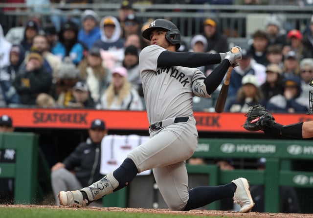 Apr 6, 2025; Pittsburgh, Pennsylvania, USA;  New York Yankees third baseman Oswald Peraza (18) hits an RBI double against the Pittsburgh Pirates during the ninth inning at PNC Park. Mandatory Credit: Charles LeClaire-Imagn Images