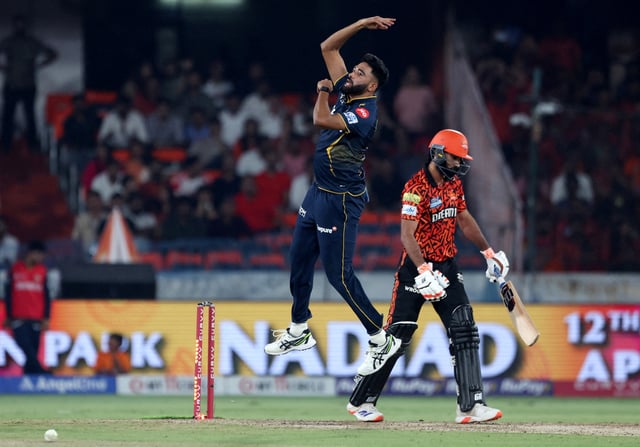 Cricket - Indian Premier League - IPL - Sunrisers Hyderabad v Gujarat Titans - Rajiv Gandhi International Cricket Stadium, Hyderabad, India - April 6, 2025 Gujarat Titans' Mohammed Siraj celebrates after taking the wicket of Sunrisers Hyderabad's Simarjeet Singh REUTERS/Stringer