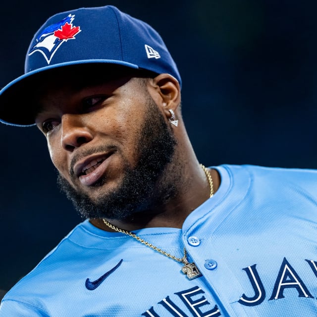 Blue Jays first baseman Vladimir Guerrero Jr. (27) looks on prior to MLB baseball action against the Washington Nationals in Toronto on Monday, March 31, 2025. THE CANADIAN PRESS/Thomas Skrlj