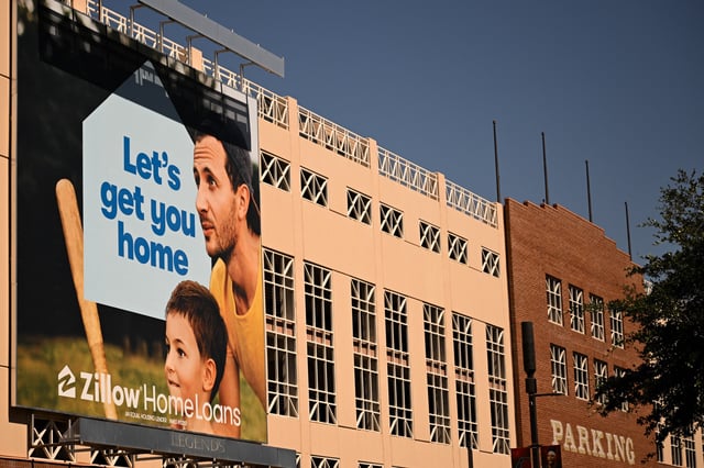 Zillow Home Loans mortgage signage is displayed in downtown Phoenix, Arizona, on June 5, 2024.