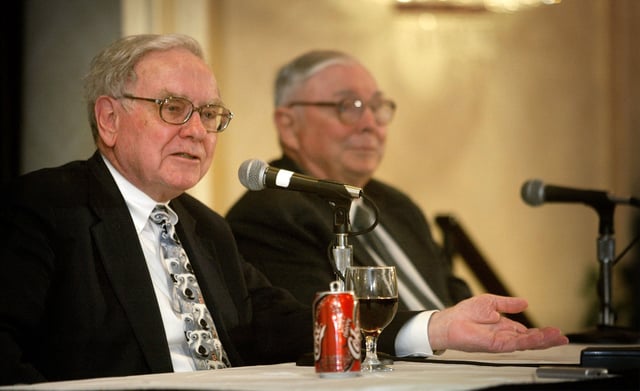 Berkshire Hathaway&#39;s CEO Warren Buffett (left) and his business partner Vice Chairman Charles Munger answer questions at a news conference May 4, 2003 in Omaha, Nebraska.