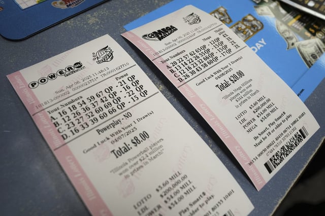 Purchased Powerball and Mega Millions tickets are shown at Mares Mart in Chicago, Sunday, April 6, 2025. (AP Photo/Nam Y. Huh)