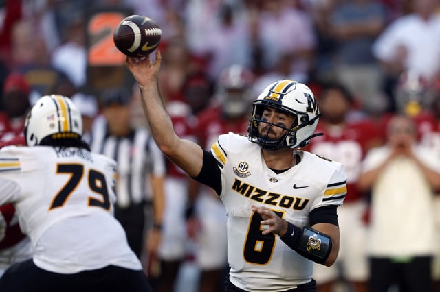 Oct 26, 2024; Tuscaloosa, Alabama, USA;  Missouri Tigers quarterback Drew Pyne (6) throws a pass against the Alabama Crimson Tide during the second half at Bryant-Denny Stadium. Mandatory Credit: Butch Dill-Imagn Images/ File Photo