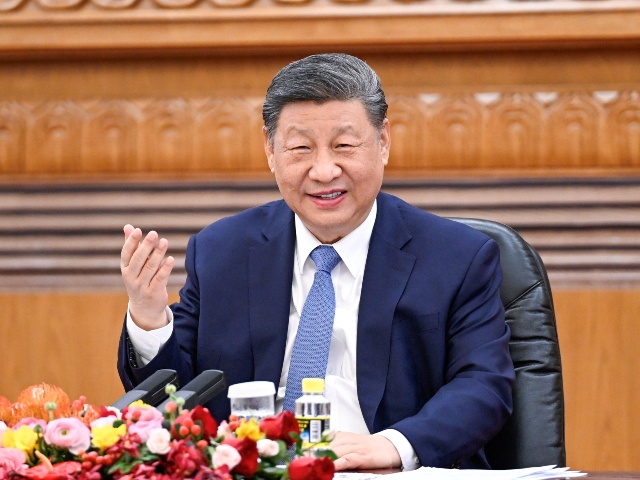 Chinese President Xi Jinping meets with representatives of the international business community at the Great Hall of the People in Beijing, capital of China, March 28, 2025. (Photo by Li Xueren/Xinhua via Getty Images)