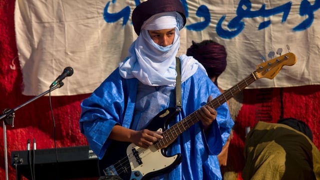 Tuareg blues music blends Jimi Hendrix-style electric rock with traditional Saharan sounds