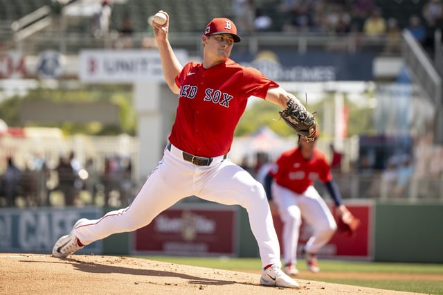 FORT MYERS, FLORIDA - MARCH 15: Quinn Priester #68 of the Boston Red Sox pitches during the first inning of a spring training game against the Atlanta Braves at JetBlue Park at Fenway South in Fort Myers, Florida on March 15, 2025.