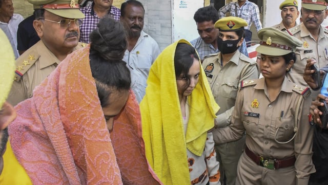 Police take away Saurabh Rajput's wife Muskan and Sahil Shukla after they were arrested in connection with his murder. (File)