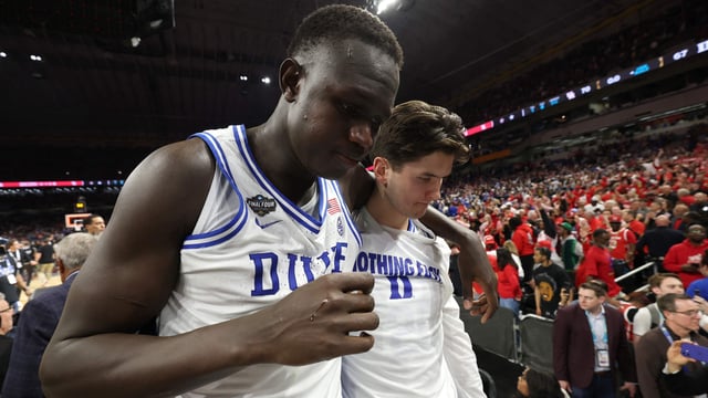 Khaman Maluach #9 of the Duke Blue Devils reacts with teammate after the second half in the Final Four game of the NCAA Men's Basketball Tournament against the Houston Cougars at the Alamodome on April 05, 2025 in San Antonio, Texas. (Photo by JAMIE SQUIRE / GETTY IMAGES NORTH AMERICA / Getty Images via AFP)
