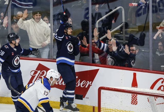 Winnipeg Jets' Morgan Barron (36) celebrates his goal against the St. Louis Blues during second period NHL action in Winnipeg on Monday, April 7, 2025. THE CANADIAN PRESS/John Woods