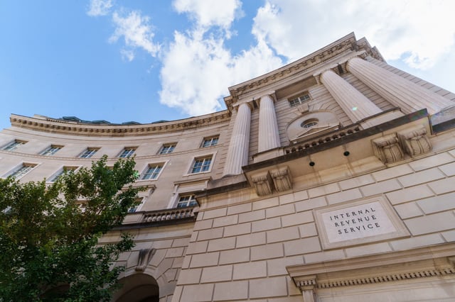 An etched sign marks an entrance to the U.S. Internal Revenue Service (IRS) headquarters building on September 15, 2024, in Washington, DC.