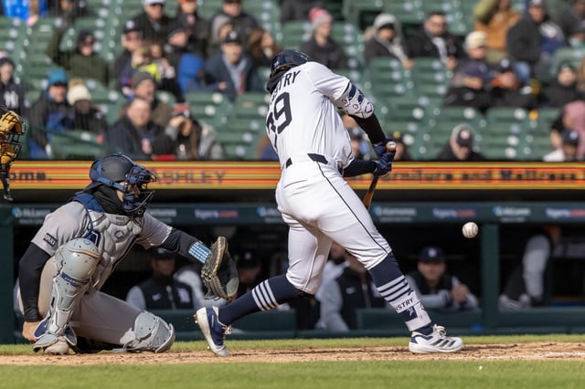 Apr 7, 2025; Detroit, Michigan, USA; Detroit Tigers shortstop Zach McKinstry (39) singles to left in the eighth inning against the New York Yankees at Comerica Park. Mandatory Credit: David Reginek-Imagn Images