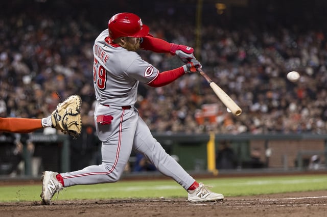 Apr 7, 2025; San Francisco, California, USA;  Cincinnati Reds right fielder Blake Dunn (59) hits a two-run double against the San Francisco Giants during the eighth inning at Oracle Park. Mandatory Credit: John Hefti-Imagn Images