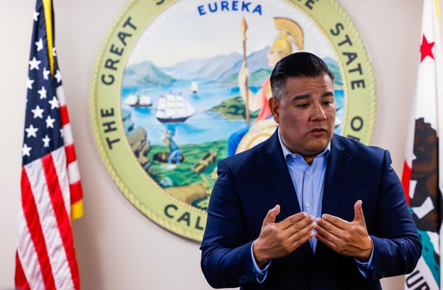 California Insurance Commissioner Ricardo Lara, seen here in Oakland in February, has granted State Farm preliminary approval to raise rates by 22% for homeowners. But the approval is conditional on the company justifying the price hike to an administrative law judge. 