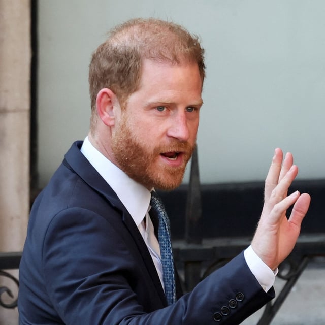Britain's Prince Harry gestures as he walks on the day he is expected to give evidence in his appeal against the rejection of his legal challenge to the British government's decision to take away his police protection when he is in Britain, outside the High Court in London, Britain, April 8, 2025. REUTERS/Isabel Infantes