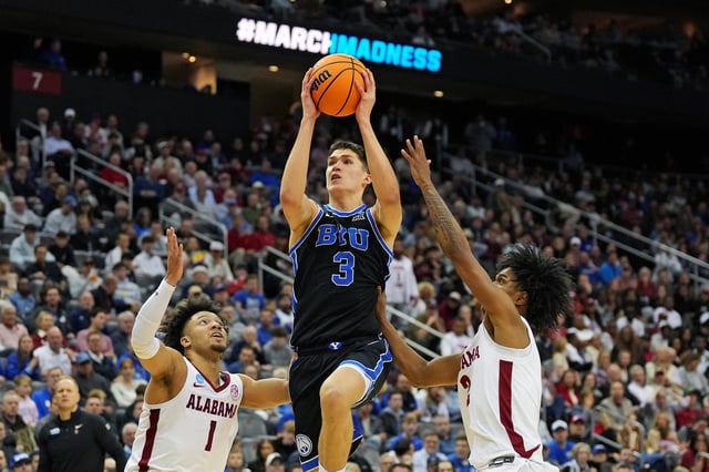 Mar 27, 2025; Newark, NJ, USA; Brigham Young Cougars guard Egor Demin (3) drives to the basket against Alabama Crimson Tide guard Mark Sears (1) during the second half during an East Regional semifinal of the 2025 NCAA tournament at Prudential Center. Mandatory Credit: Robert Deutsch-Imagn Images/ File Photo