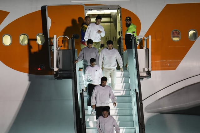 Venezuelan migrants deported from the United States arrive at Simon Bolivar International Airport in Maiquetia, Venezuela, Monday, March 24, 2025. (AP Photo/Ariana Cubillos)