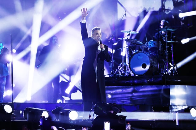 Robbie Williams attends "X Factor" TV Show at Piazza Del Plebiscito on December 05, 2024 in Naples, Italy.
