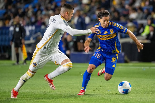 Diego Lainez #16 of Tigres UANL is defended by Gabriel Pec #11 of Los Angeles Galaxy during the second half of the CONCACAF Champions Cup game between Los Angeles Galaxy and Tigres UANL at Dignity Health Sports Park on April 1, 2025 in Carson, California. The game ended with a 0-0 tie.